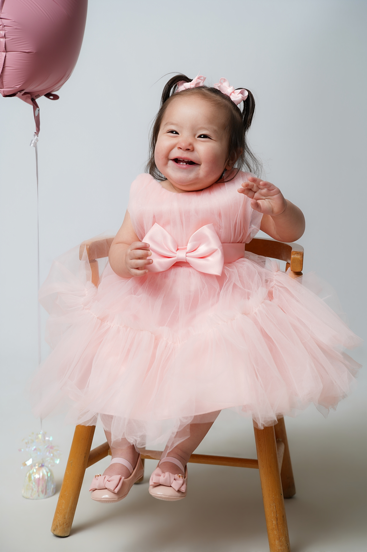 Sweet tulle dress portrait on wooden chair